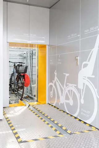 Vollautomatische und mechanische Fahrrad-Parksysteme Vollautomatische und mechanische Fahrrad-Parksysteme