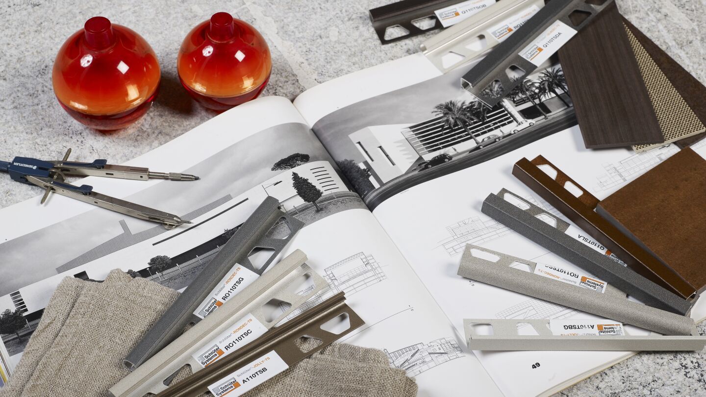 Abschluss- und Dekorprofile für geflieste Wände und Sockelbereiche