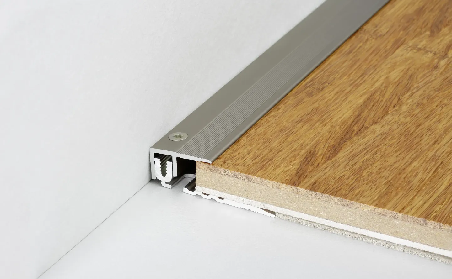 Fußbodenprofilsysteme für Parkett, Laminat, LVT-Designbeläge und Teppich Fußbodenprofilsysteme für Parkett, Laminat, LVT-Designbeläge und Teppich