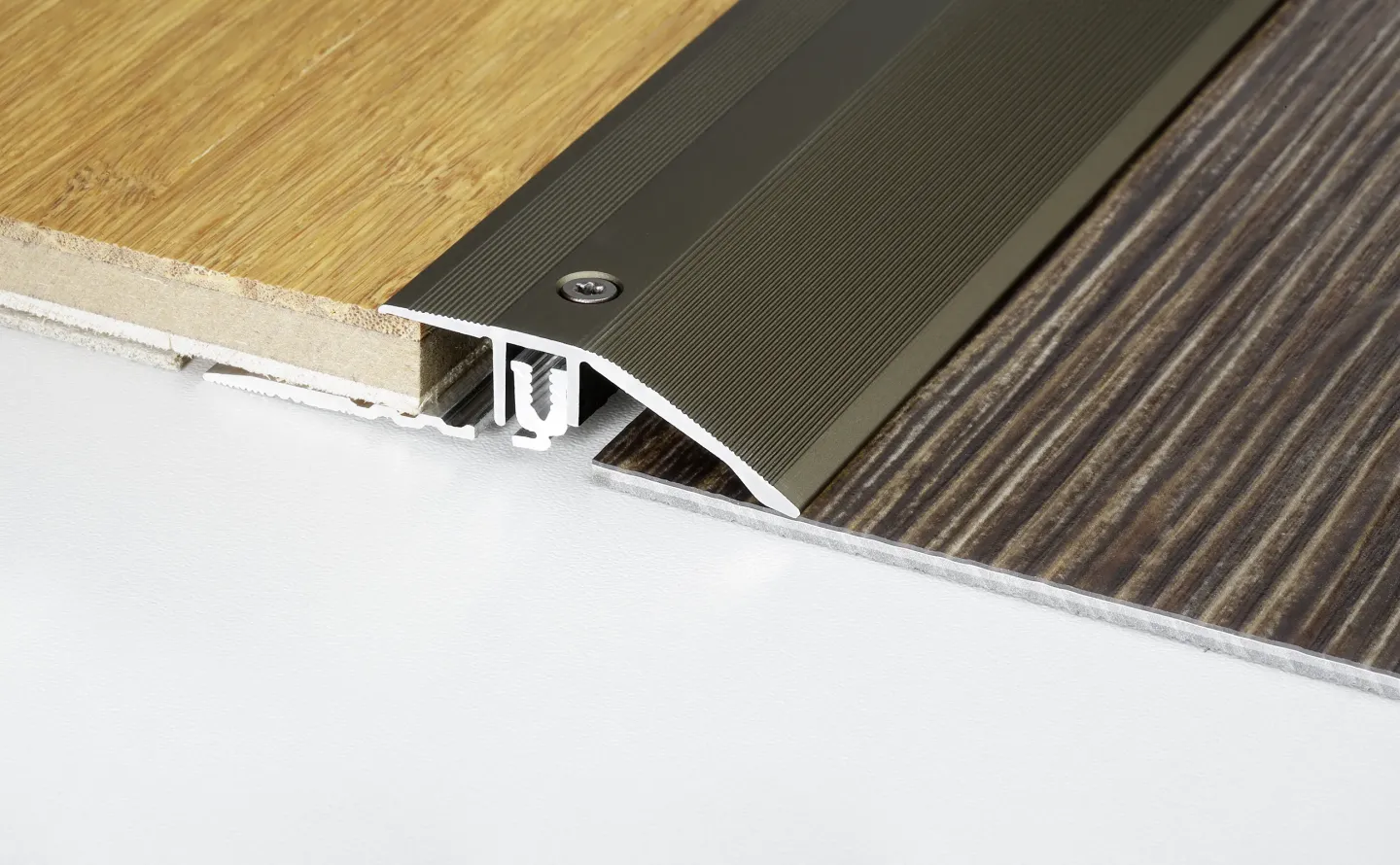 Fußbodenprofilsysteme für Parkett, Laminat, LVT-Designbeläge und Teppich Fußbodenprofilsysteme für Parkett, Laminat, LVT-Designbeläge und Teppich