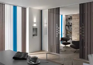 Lamellenvorhänge für den innenliegenden Sonnenschutz Lamellenvorhänge für den innenliegenden Sonnenschutz