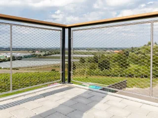 X-TEND Edelstahlseilnetze als Sicherungs- und Designelemente X-TEND Edelstahlseilnetze als Sicherungs- und Designelemente