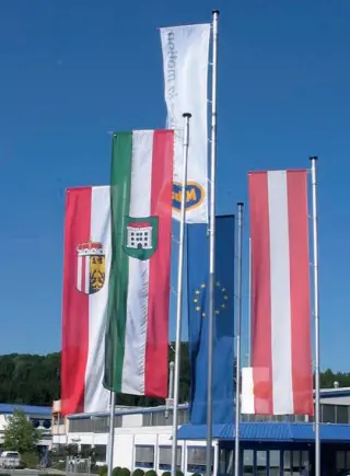 Zylindrische, ovale und konische Fahnenmasten und Präsentationssysteme Zylindrische, ovale und konische Fahnenmasten und Präsentationssysteme