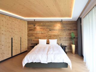 Moderne Holzarchitektur und integratives Licht im Dienste der Gesundheit